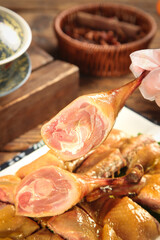 Chinese Style Waxed Duck Meat Served with Chopsticks on White Plate Traditional Asian Cuisine