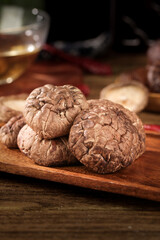 Dried Wild Mushrooms on Wooden Board - Aromatic Culinary Ingredients Still Life Photography