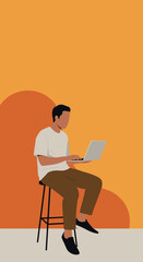 Modern man focused on work, typing on a laptop while sitting on a stool, illustrating remote work and digital communication. Ideal for business and lifestyle concepts.