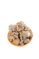 Dried Panax Pseudoginseng Wenshan Notoginseng Chinese Medicinal Herbs in Wooden Bowl on White Background
