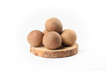 Fototapeta premium Fresh Longan Fruits on Wooden Board White Background