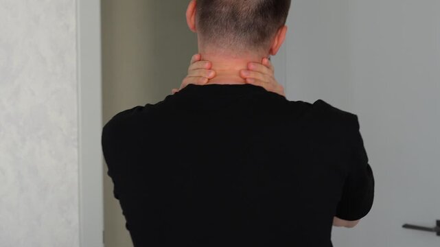 Chronic back pain in a young man.
Man massages his neck to relieve pain from poor posture.
Neck and back pain.
Patient with scoliosis