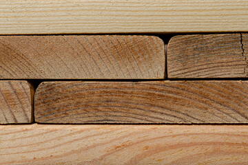 Wooden planks arranged side by side, emphasizing their textures colors. Warm tones patterns highlight the beauty of natural wood grains Perfect natural background for your design Copy space