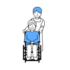 高齢者の車椅子を介助する介護士