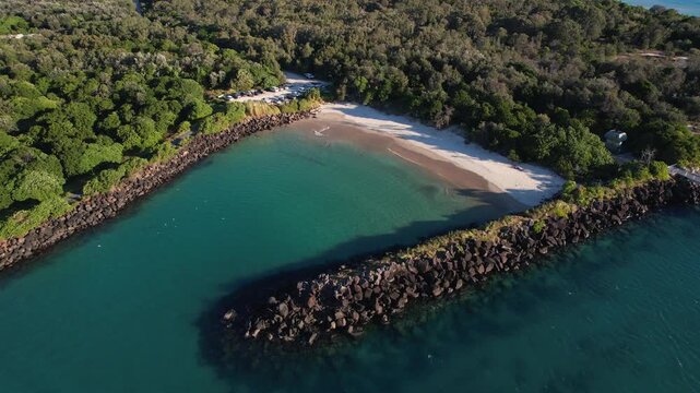 Secluded Beach With Rock Walls At Marlo's Beach In Fingal Head, New South Wales, Australia. Aerial Drone Shot