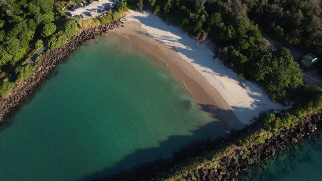 Top View Of Marlo's Beach And Tweed River Mouth In Northern Rivers, New South Wales, Australia. Aerial Pullback Shot