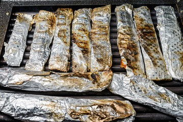 Grilled fish in aluminum foil