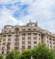 Obraz premium 30-05-2025 Bucharest, Romania. Panoramic summer view Palace Parliament among green meadow.