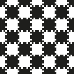 Fototapeta premium Geometric black and white pixelated chessboard pattern with jagged edges