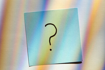 Question mark on post it note