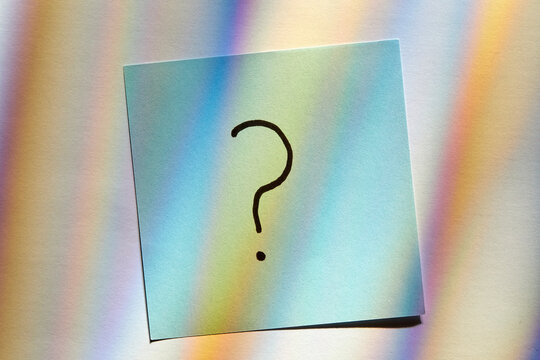 Question mark on post it note