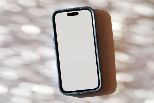 Blank smart phone on abstract background