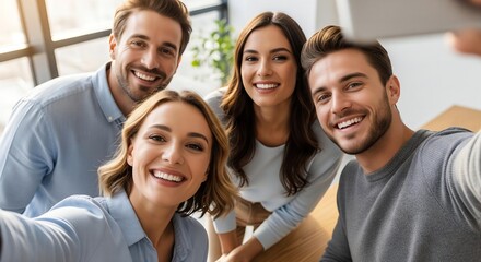 Colleagues Smiling in a Sunlit Office Group Selfie