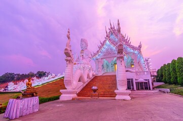 The Naga staircases to the Ordination Hall and Guan Yin statue, Wat Huai Pla Kang in Chiang Rai, Thailand