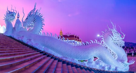 Traditional Naga sculptures along Wat Huai Pla Kang Temple steps, Chiang Rai, Thailand