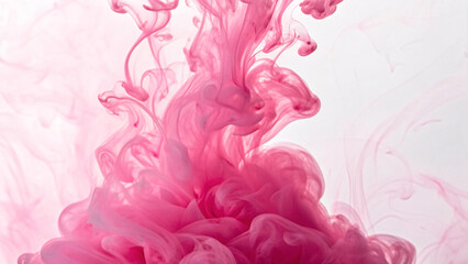 Vibrant pink ink swirls gracefully through clear water, creating mesmerizing fluid patterns with flowing tendrils and organic shapes against white backdrop.