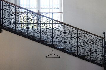 Staircase with ornate metal balustrade