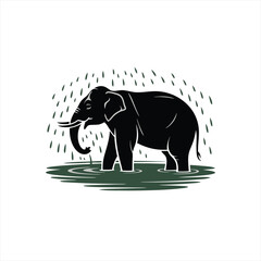 Obraz premium Elegant Silhouette of an African Elephant Standing in Water Underneath a Gentle Rainfall Depicting Nature's Serenity and Majestic Wildlife