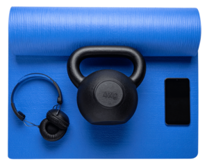 Flat Lay Black 2kg Kettlebell with Yoga Mat and Headphones on transparent background PNG 