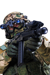 Fototapeta premium Military soldier aiming weapon equipped with tactical gear and night vision