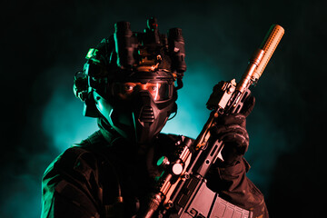 Tactical operatives in advanced gear holding modern weaponary with dramatic lighting