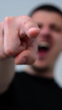 An angry and unfriendly laugh of a guy who points at someone and smiles.
Mocking laughter at a weakling.
Abuse and bullying among teenagers.
Teenager mocks classmate