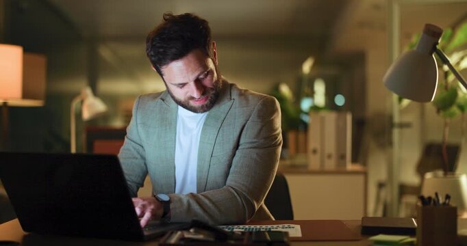 Night, office and business man on computer for online proposal, company revenue and expense report. Dark, corporate and person typing with documents for financial review, budget planning and deadline