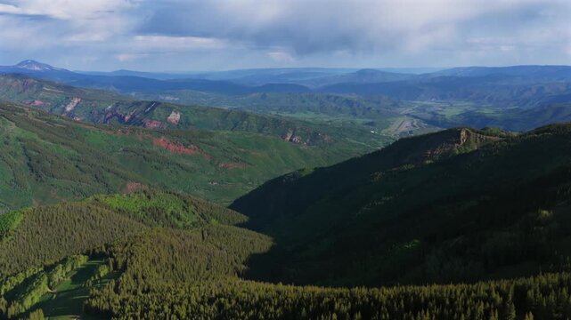 Aspen Pitkin County Airport spring summer Aspen Highlands Little Annie Basin Trailhead AJAX top of Aspen Mountain aerial drone melting snow Rocky Mountains morning sunny blue sky forward