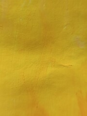 Vibrant Yellow Painted Texture with Brushstrokes