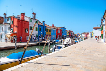 Colorful houses in a canal street houses of Burano island, Venice, Italy