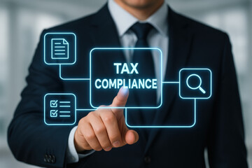 Tax compliance concept with businessman pointing on virtual screen with icons and text