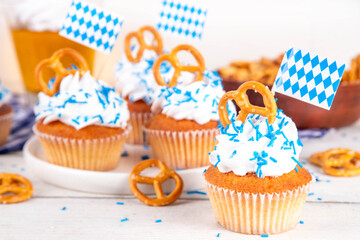 Oktoberfest cupcakes with pretzel and colorful sugar sprinkles