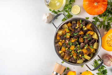 Pumpkin stew with potato and beef meat