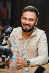 Content creator recording podcast in professional studio