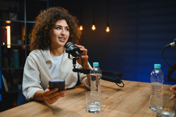 Content creator recording podcast in professional studio