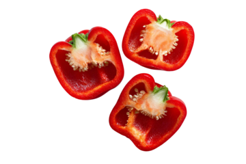 Three halved red bell peppers 