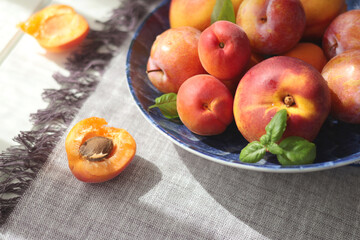 Fruits on porcelain plate with blue pattern. Food and vitamins, healthy eating. Seasonal food.