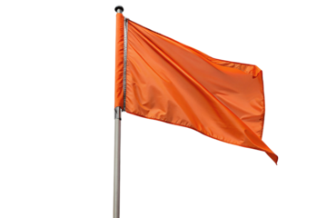Bright orange flag waving in windy weather isolated on black background, perfect for design use