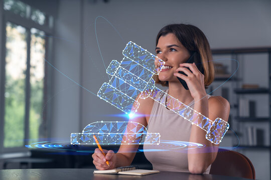 Smiling businesswoman in casual wear holding using smartphone typing at office workplace with notebook. Concept of distant work, business education. Law and legal theme icons hologram