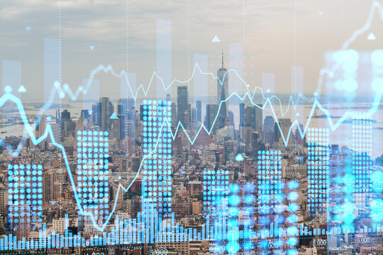 Double exposure of New York cityscape with blue holographic stock market data overlay. Financial technology and business concept. Double exposure - Powered by Adobe