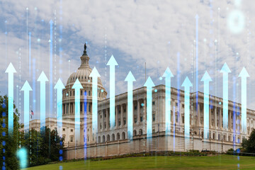 United States Capitol building with a holographic overlay of upward arrows and binary code, on a cloudy sky background. Technology and politics concept. Double exposure