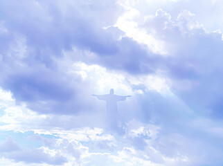 Jesus Christ In The Clouds on sky background	
