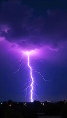 Fototapeta premium Spectacular lightning bolt striking during a powerful summer thunderstorm, illuminating the dark night sky Dramatic, intense, and awe-inspiring natural phenomenon , tempest, intense light, awesome