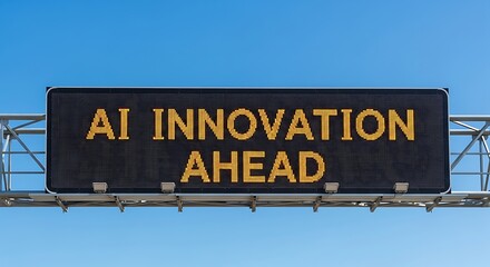 Illuminated sign displaying the message ai innovation ahead against a clear blue sky, symbolizing technological advancement and future opportunities