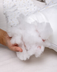 the composition of the pillow is a close-up of the sintepon filling