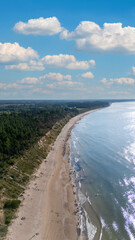 Drone Flight Over Jurkalne Steep Coastline On A Sunny Summer Day Revealing Baltic Sea Shore Sandy Trails Green Fields And Peaceful Nature Landscape In Latvia