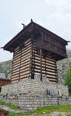 Traditional Fort Architecture of Chitkul Fort with Town Nestled Against the Mountain Range in Backdrop, Kinnaur, Himachal Pradesh, India.