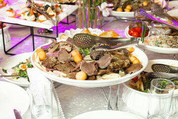 Kazakh national dish beshbarmak on the festive table