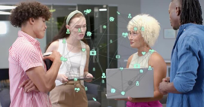 Colleagues in office initiating data sharing by tapping devices, animating green network icons