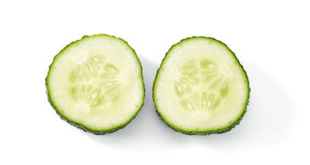 Slices of cucumber isolated on white background. Top view.